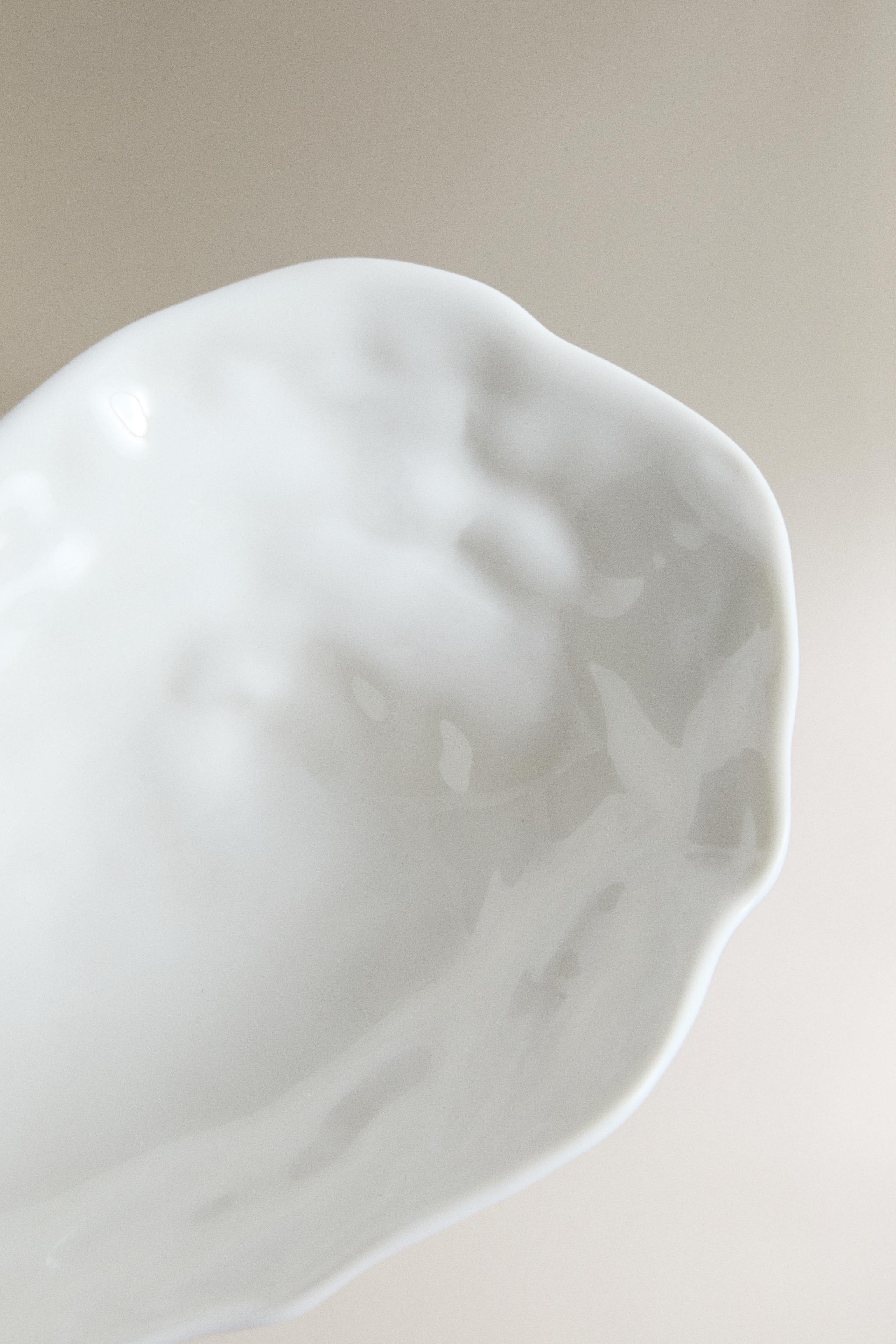 PETIT PLAT EN PORCELAINE COQUILLAGE